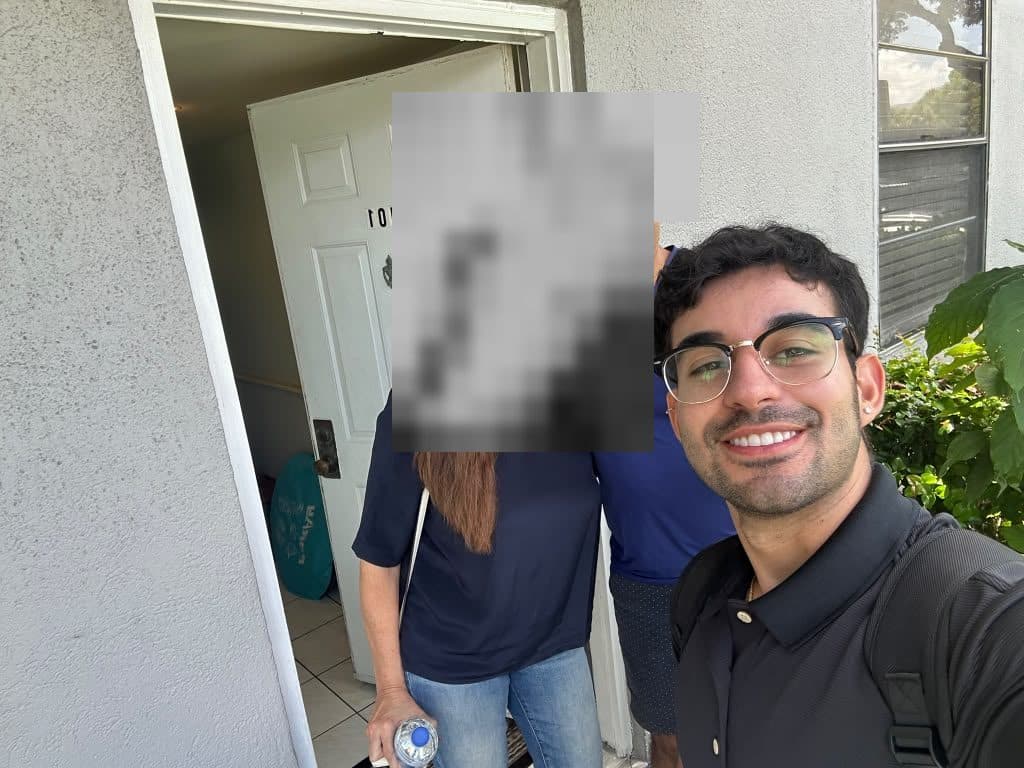 The founder at a homeowner's door